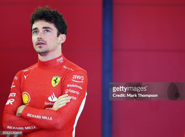 Charles Leclerc of Monaco and Ferrari looks on in the garage during day three of F1 Testing at Bahrain International Circuit on February 23, 2024 in...