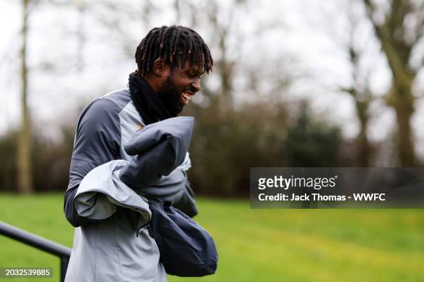 Boubacar Traore of Wolverhampton Wanderers makes their way out to the pitch ahead of a Wolverhampton Wanderers Training Session at The Sir Jack...