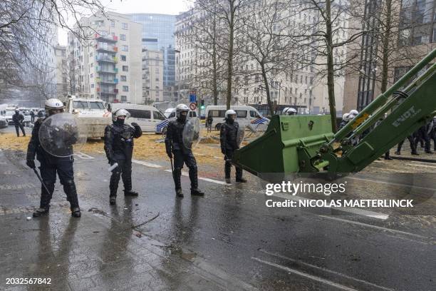 Police pictured during a protest action of farmers' organizations 'Federation Unie de Groupements d'Eleveurs et d'Agriculteurs' , Boerenforum and...