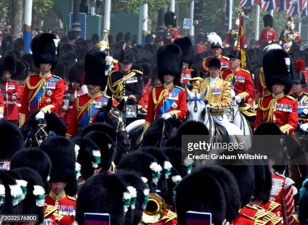 King Charles III, William, Prince of Wales, and Anne, Princess Royal, on The Mall on their return to Buckingham Palace after after Trooping The...