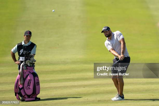 Peter Uihlein of the United States pitches onto the green on hole 7 during the second round of the International Series Oman at Al Mouj Golf on...