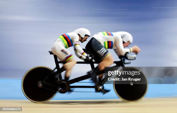 Neil Fachie of Black Line and Matthew Rotherham of ESV Manchester compete in the Men's Time Trial Para B Heat 1 at National Cycling Centre on...