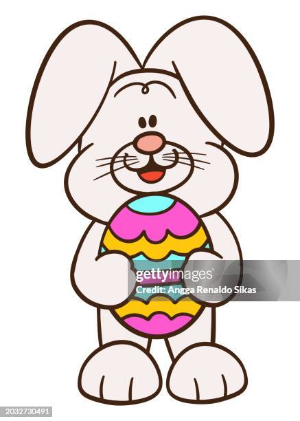 eater bunny rabbit with easter egg cartoon isolated on white - easter egg isolated stock illustrations