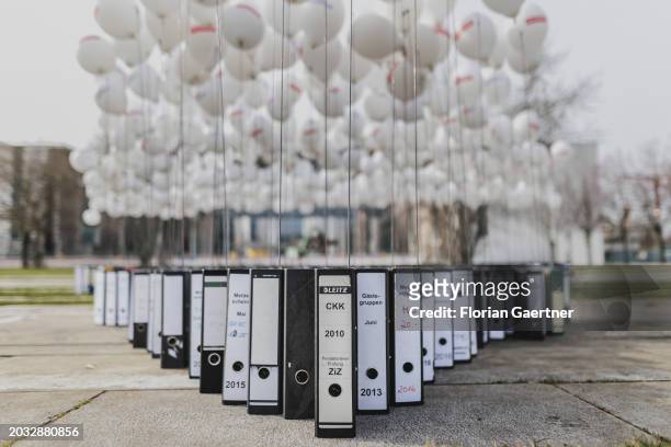 Folders are pictured during a protest of the Central Association of German Crafts in front of the Federal Chancellery on February 26, 2024 in Berlin,...