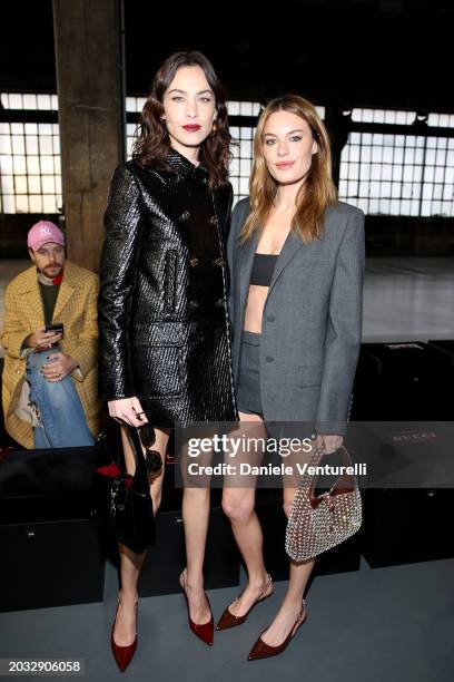 Alexa Chung and Camille Rowe attend the Gucci Women's Fall Winter 2024 Fashion Show during Milan Fashion Week Womenswear Fall/Winter 2024-2025 at...