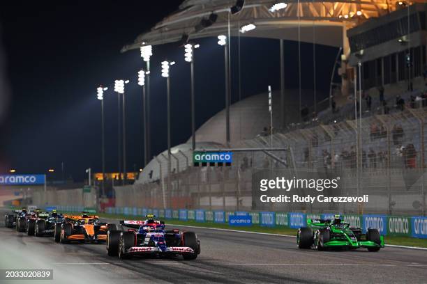 Yuki Tsunoda of Japan driving the Visa Cash App RB VCARB 01 and Zhou Guanyu of China driving the Kick Sauber C44 Ferrari line up on the front row of...