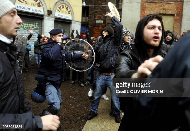 Students clash with policemen during a demonstration on December 22, 2010 in downtown Milan, to protest against a radical reform of the university...