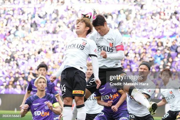 Takahiro Sekine and Hiroki Sakai of Urawa Reds in action during the J.LEAGUE MEIJI YASUDA J1 1st Sec. Math between Sanfrecce Hiroshima and Urawa Red...