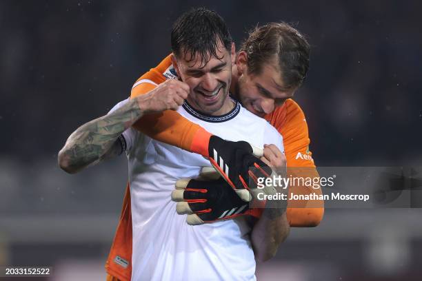 Alessio Romagnoli and Ivan Provedel of SS Lazio embrace as they celebrate the 2-0 victory following the final whistle of the Serie A TIM match...