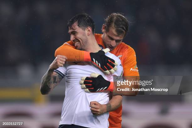 Alessio Romagnoli and Ivan Provedel of SS Lazio embrace as they celebrate the 2-0 victory following the final whistle of the Serie A TIM match...