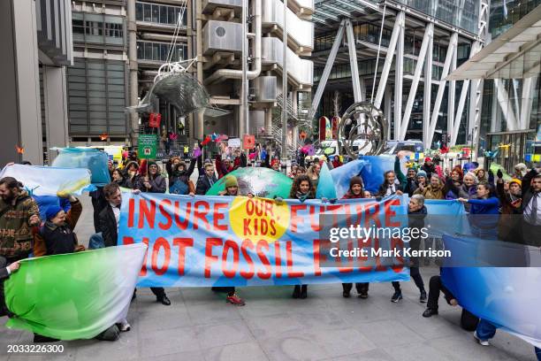 Climate activists from Mothers Rise Up protest outside Lloyds of London as part of a series of actions by Extinction Rebellion and Sunrise's Insure...