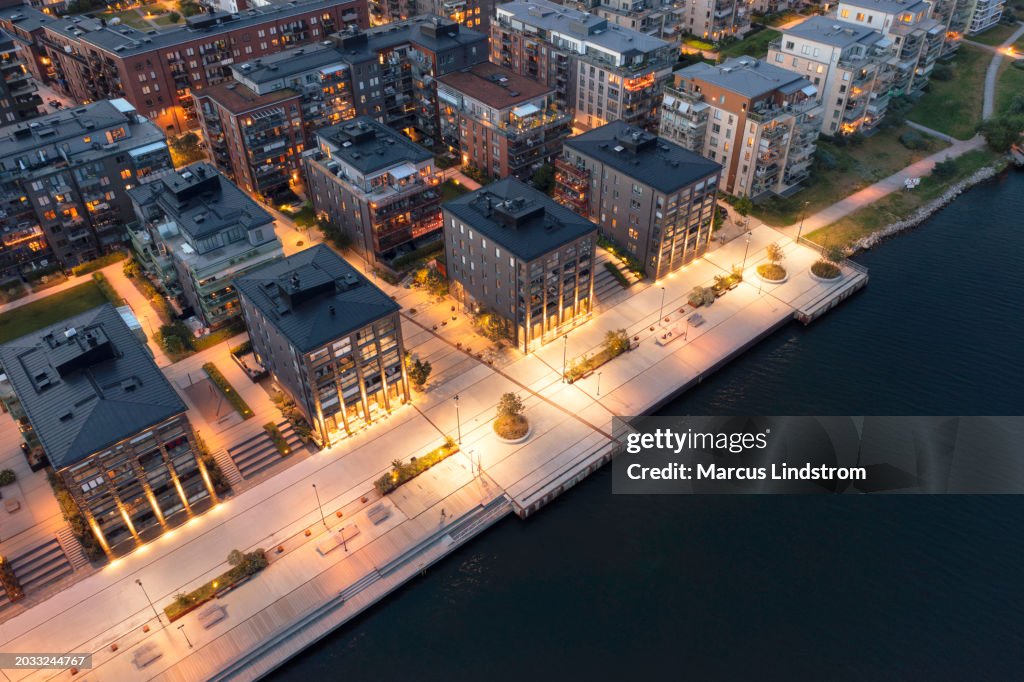 Aerial view of modern seaside apartments in the evening