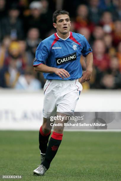 Nacho Novo of Glasgow Rangers running during the Scottish Premiership match between Motherwell and Glasgow Rangers at Fir Park on October 17, 2004 in...