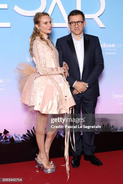 Diane Kruger and Dany Boon arrive at the 49th Cesar Film Awards at L'Olympia on February 23, 2024 in Paris, France.