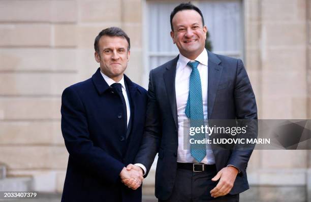 France's President Emmanuel Macron greets Ireland's Prime Minister Leo Varadkar as he arrives at the Elysee presidential palace in Paris, on February...