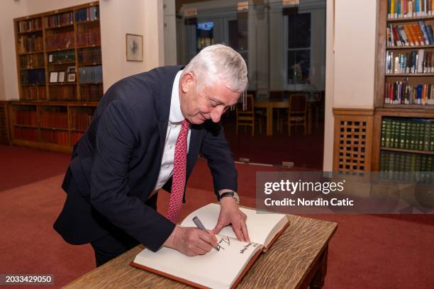 Sir Lindsay Hoyle, Speaker of the House of Commons, signs visitors book at The Cambridge Union on February 23, 2024 in Cambridge, England.