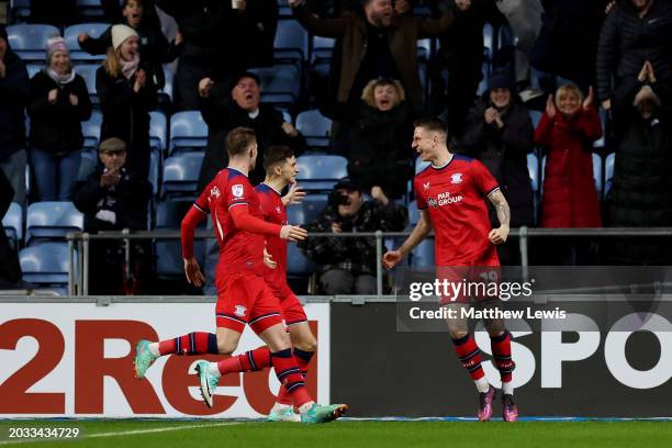 Emil Riis Jakobsen of Preston North End celebrates scoring his team's first goal with teammates during the Sky Bet Championship match between...
