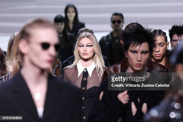 Gigi Hadid and models walk the runway at the Versace fashion show during the Milan Fashion Week Womenswear Fall/Winter 2024-2025 on February 23, 2024...
