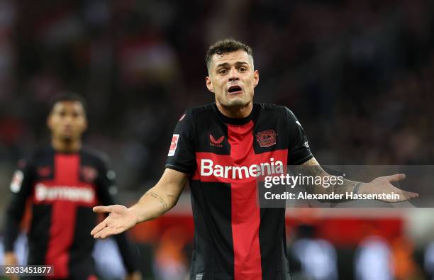 Granit Xhaka of Bayer Leverkusen reacts during the Bundesliga match between Bayer 04 Leverkusen and 1. FSV Mainz 05 at BayArena on February 23, 2024...