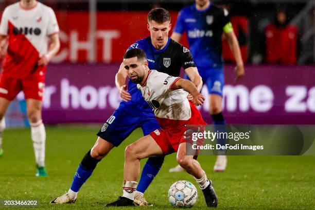 Ajdin Hrustic of Heracles Almelo and Marouan Azarkan of FC Utrecht battle for the ball during the Dutch Eredivisie match between FC Utrecht and...