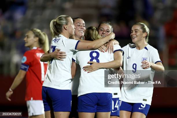 Grace Clinton of England celebrates scoring her team's second goal with teammates during the Women's international friendly match between England and...