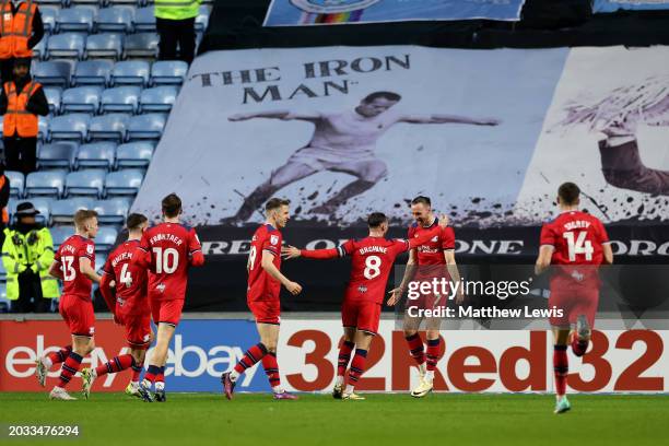 Will Keane of Preston North End celebrates scoring his team's second goal with teammates during the Sky Bet Championship match between Coventry City...