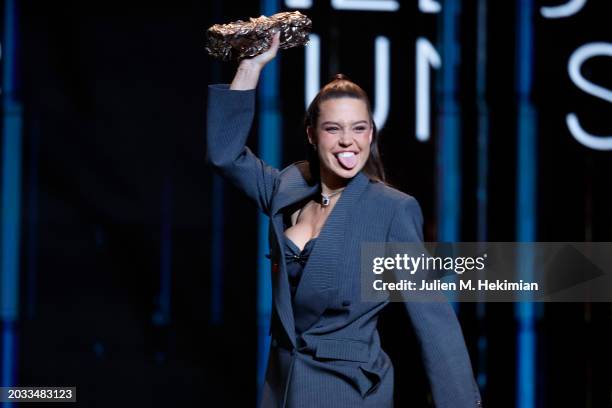Adèle Exarchopoulos accepts the 'Best Supporting Actress' Cesar Award for the movie 'Je verrai toujours vos visages' on stage during the 49th Cesar...