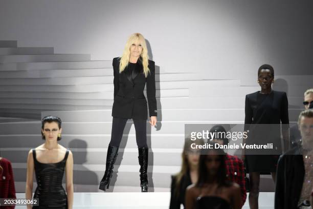 Designer Donatella Versace walks the runway at the Versace fashion show during the Milan Fashion Week Womenswear Fall/Winter 2024-2025 on February...