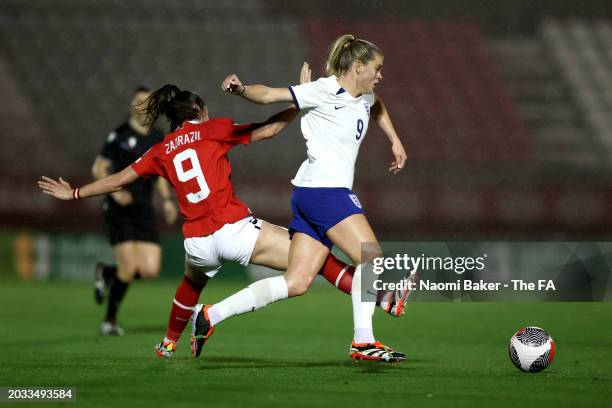 Alessia Russo of England is challenged by Sarah Zadrazil of Austria during the Women's international friendly match between England and Austria at...