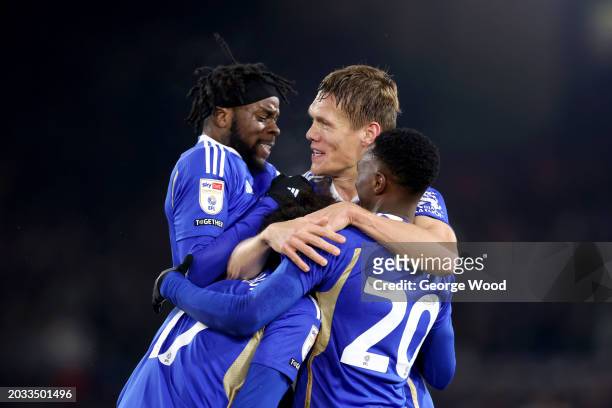Stephy Mavididi, Jannik Vestergaard and Patson Daka of Leicester City celebrate their team's first goal scored by teammate Wout Faes during the Sky...