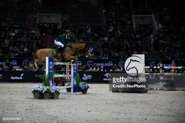 Jaroslaw Skrzyczynski is riding his horse Komboy during the World Cup Grand Prix for the PKO Bank Polski prize at Cavaliada in Tauron Arena in...