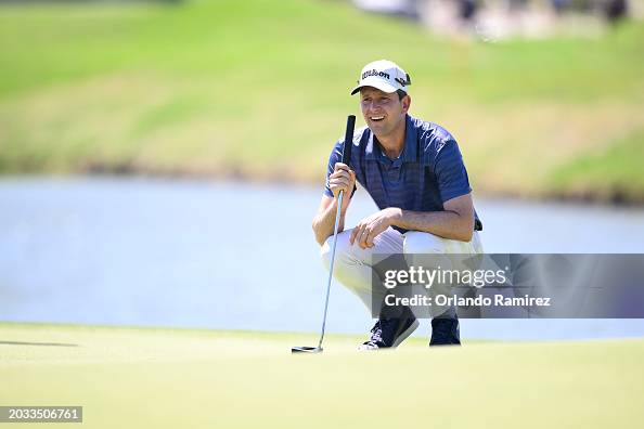 Martin Trainer Martin Trainer of the United States lines up a putt on the 11th green ...