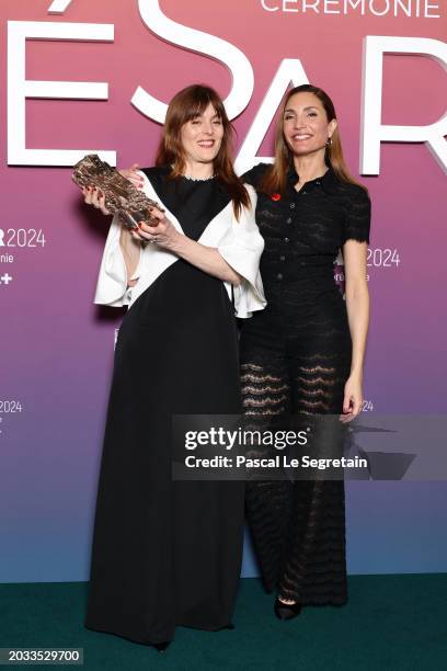 Valérie Donzelli and Audrey Diwan pose in the winners room with the 'Best Adapted Screenplay' Cesar Award for the movie 'L’amour et les forêts'...