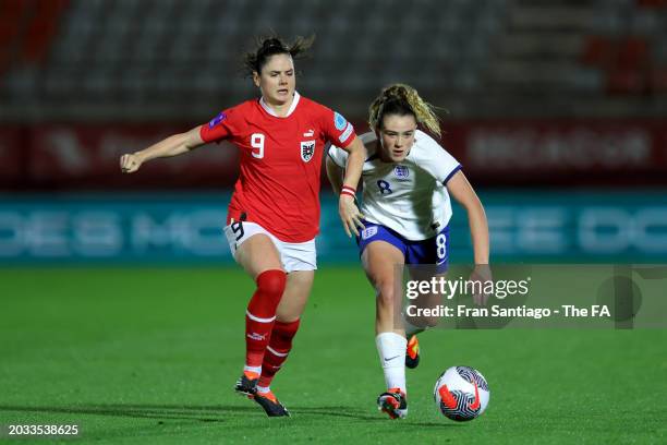 Sarah Zadrazil of Austria battles for possession with Grace Clinton of England during the Women's international friendly match between England and...