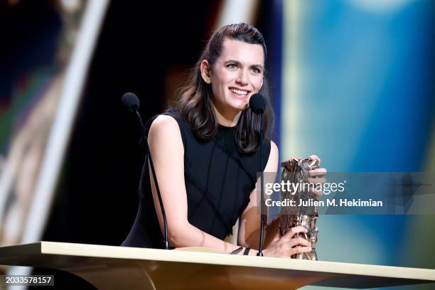 Ella Rumpf accepts the 'Best Female Newcomer' Cesar Award for the movie 'Le théorème de marguerite' on stage during the 49th Cesar Film Awards at...