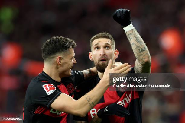 Robert Andrich of Bayer Leverkusen celebrates with Granit Xhaka of Bayer Leverkusen after scoring his team's second goal during the Bundesliga match...