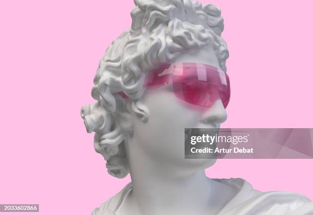 3d digital bust of apollo god wearing a virtual reality goggles. - griechische kultur stock-fotos und bilder