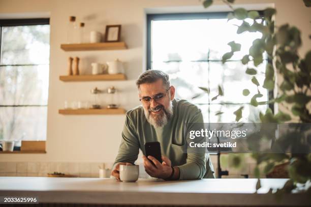 starting the day the chilled way - coffee break at home stock pictures, royalty-free photos & images