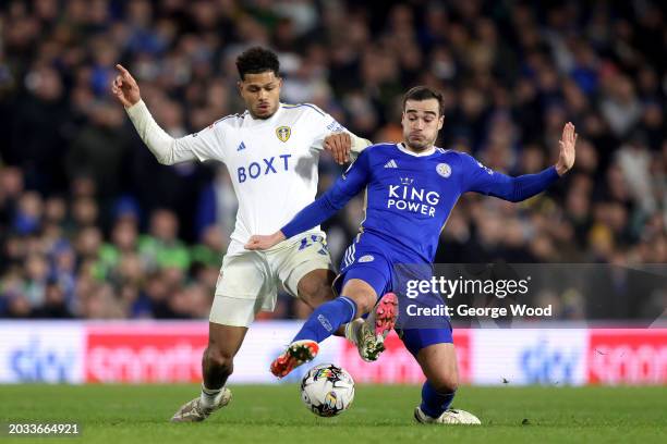 Georginio Rutter of Leeds United and Harry Winks of Leicester City battle for possession during the Sky Bet Championship match between Leeds United...