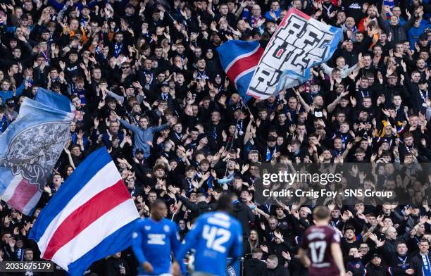 Rangers fans during a cinch Premiership match between Rangers and Heart of Midlothian at Ibrox Stadium, on February 24 in Glasgow, Scotland.