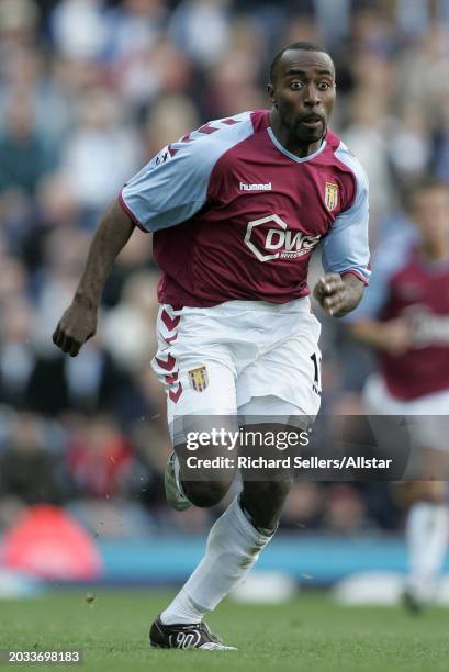 Darius Vassell of Aston Villa running during the Premier League match between Blackburn Rovers and Aston Villa at Ewood Park on October 2, 2004 in...