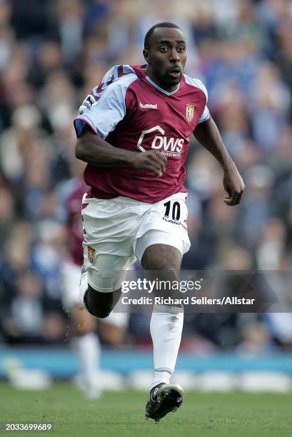 Darius Vassell of Aston Villa running during the Premier League match between Blackburn Rovers and Aston Villa at Ewood Park on October 2, 2004 in...