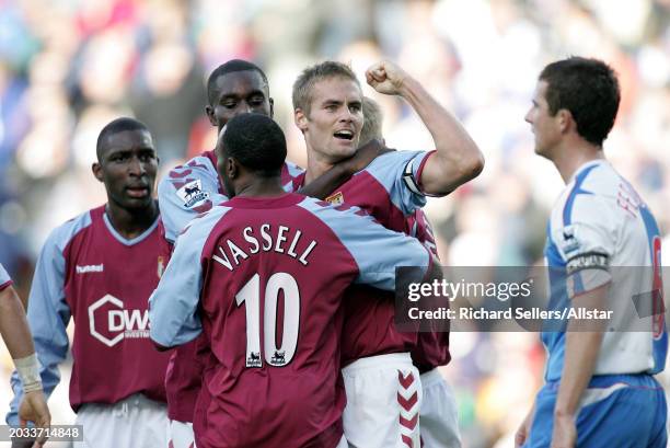 Olof Mellberg of Aston Villa celebrates during the Premier League match between Blackburn Rovers and Aston Villa at Ewood Park on October 2, 2004 in...