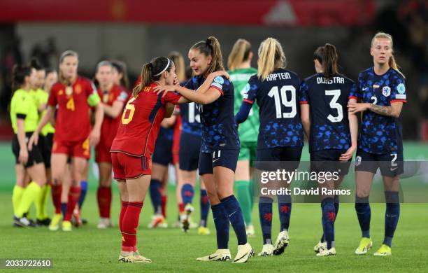 Aitana Bonmati of Spain and Lieke Martens of Netherlands interact following the UEFA Women's Nations League 2024 semifinal match between Spain and...