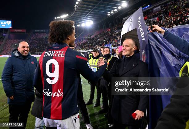 Joshua Zirkzee of Bologna FC celebrates with Joey Saputo, Chairman of Bologna FC, following the team's victory in the Serie A TIM match between...