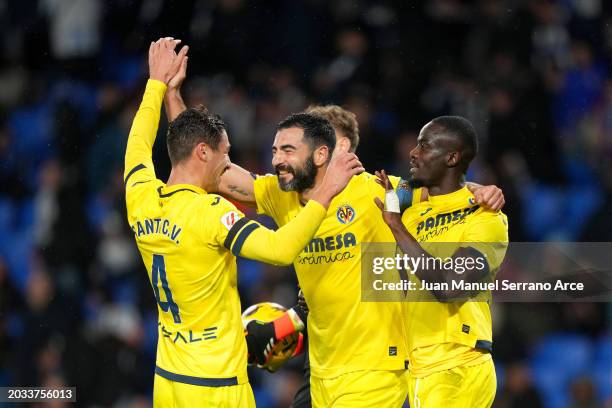 Santi Comesana, Raul Albiol and Eric Bailly of Villarreal CF celebrate following the team's victory in the LaLiga EA Sports match between Real...