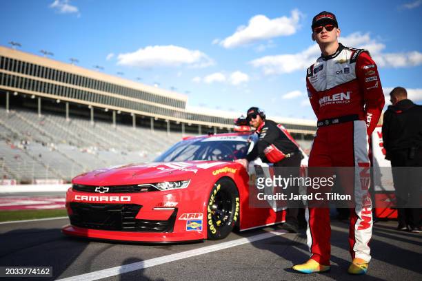 Jesse Love, driver of the Whelen Chevrolet, looks on during qualifying for the NASCAR Xfinity Series King of Tough 250 at Atlanta Motor Speedway on...