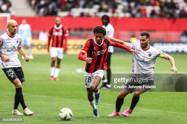 Hicham BOUDAOUI of Nice and Johan GASTIEN, Florent OGIER of Clermont during the Ligue 1 Uber Eats match between Olympique Gymnaste Club Nice and...
