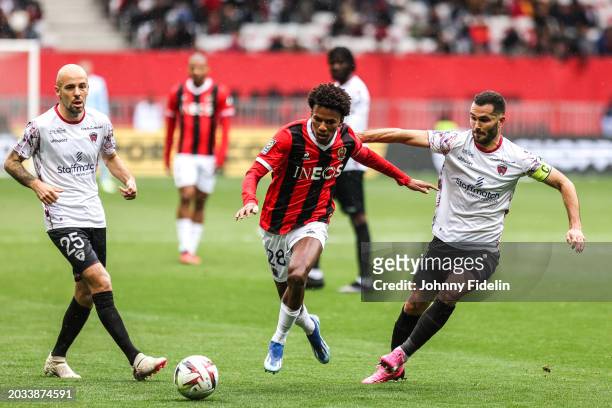 Hicham BOUDAOUI of Nice and Johan GASTIEN, Florent OGIER of Clermont during the Ligue 1 Uber Eats match between Olympique Gymnaste Club Nice and...