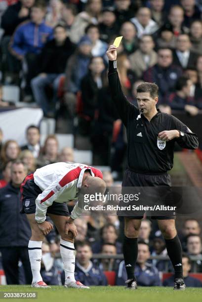 David Beckam ion England s shown tellow card by Referee Terje Hauge during the Group Six World Cup Qualifier, match between England and Wales at Old...